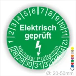 Grünes Prüfetikett mit der Aufschrift "Elektrisch geprüft" und Angaben zum nächsten Prüftermin, geeignet für Geräte mit einem Durchmesser von 20-50 mm.