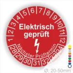 Roter Aufkleber mit der Aufschrift "Elektrisch geprüft" und einem Blitzsymbol, um den nächsten Prüftermin anzuzeigen. Durchmesser von 20-50 mm, geeignet für die Kennzeichnung elektrischer Geräte.