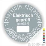 Pruefplakette mit Text Elektrisch geprüft gemäß Paragrapf als Zeichen und Beschriftungfeld zum eintragen des Paragraphs Farbe- Grau Startjahr- 25 mit Monatszahlen Oben und Jahreszahlen Unten Form ist Rund