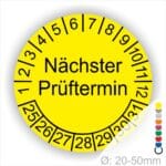 Mehrjahresplakette Prüfplakette rund, Farbe- Gelb, Text "Nächster Prüftermin" in Schwarz. Startjahr- 25, Monatszahlen Oben und Jahreszahlen Unten in Kreisform.