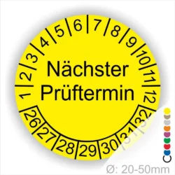 Mehrjahresplakette Prüfplakette rund, Farbe- Gelb, Text "Nächster Prüftermin" in Schwarz. Startjahr- 26, Monatszahlen Oben und Jahreszahlen Unten in Kreisform.