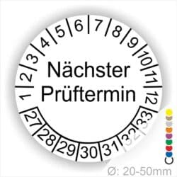 Prüfetiketten Prüfplakette rund, Farbe- Weiß, Text "Nächster Prüftermin" in Schwarz. Startjahr- 27, Monatszahlen Oben und Jahreszahlen Unten in Kreisform.