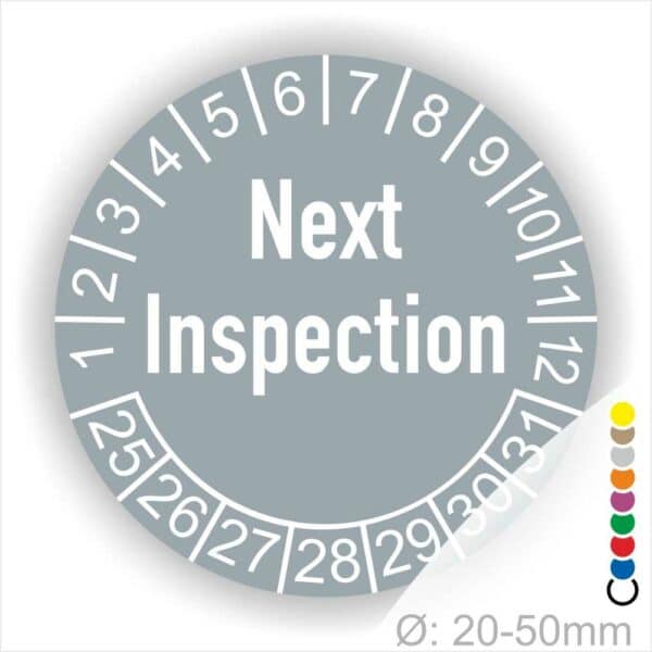 Prüfplaketten, Prüfaukleber rund, Farbe- Grau, Text auf Englisch "Next Inspection" in Weiß. Startjahr- 25, Monatszahlen Oben und Jahreszahlen Unten in Kreisform.
