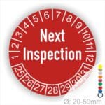 Prüfplaketten, Prüfaukleber rund, Farbe- Rot, Text auf Englisch "Next Inspection" in Weiß. Startjahr- 25, Monatszahlen Oben und Jahreszahlen Unten in Kreisform.