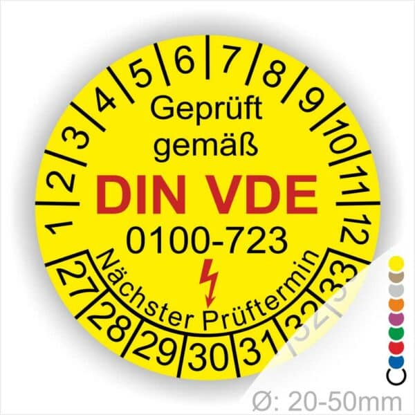 Prüfaufkleber rund, Farbe- Gelb, Text "Geprüft gemäß VDE 0100-723" in Schwarz danach ein Elektro- Pfeil in Rot, Startjahr- 27, Monatszahlen Oben und Jahreszahlen Unten in Kreisform. Über den Jahreszahlen Text "Nächster Prüftermin"