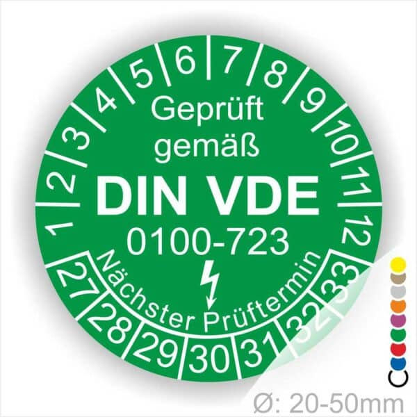 Prüfaufkleber rund, Farbe- Grün, Text "Geprüft gemäß VDE 0100-0723" in Weiß danach ein Elektro- Pfeil in Weiß, Startjahr- 27, Monatszahlen Oben und Jahreszahlen Unten in Kreisform. Über den Jahreszahlen Text "Nächster Prüftermin"