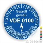VDE 0100 Prüfplakette mit dem Hinweis "Geprüft gemäß" und dem nächsten Prüftermin, geeignet für Durchmesser von 20-50 mm.