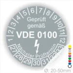 VDE 0100 Prüfplakette zur Kennzeichnung der elektrischen Sicherheit, mit Angaben zum nächsten Prüftermin und Durchmesser von 20-50 mm.