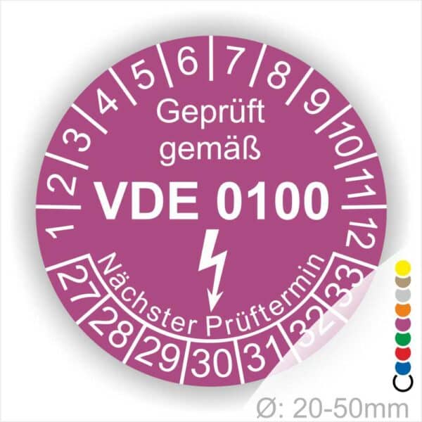 Prüfaukleber rund Farbe- Lila, Text "Geprüft gemäß VDE 0100" in Weiß danach ein Elektro- Pfeil in Weiß, Startjahr- 27, Monatszahlen Oben und Jahreszahlen Unten in Kreisform. Über den Jahreszahlen Text "Nächster Prüftermin"