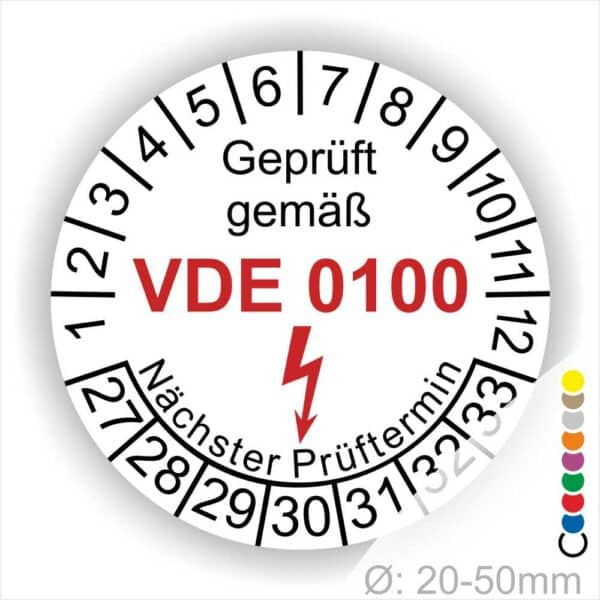 Prüfaufkleber rund, Farbe- Weiß, Text "Geprüft gemäß VDE 0100" in Schwarz danach ein Elektro- Pfeil in Rot, Startjahr- 28, Monatszahlen Oben und Jahreszahlen Unten in Kreisform. Über den Jahreszahlen Text "Nächster Prüftermin"