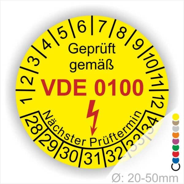 Prüfaufkleber rund, Farbe- Gelb, Text "Geprüft gemäß VDE 0100" in Schwarz danach ein Elektro- Pfeil in Rot, Startjahr- 28, Monatszahlen Oben und Jahreszahlen Unten in Kreisform. Über den Jahreszahlen Text "Nächster Prüftermin"