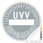 Prüfetiketten, rund, Farbe- Grau, Text "UVV Nächster Prüftermin" in Weiß. Als nächstes kommt ein Beschriftungfeld / Leerfeld in Farbe Weiß. Startjahr- 26, Monatszahlen Oben und Jahreszahlen Unten in Kreisform. über den Jahreszahlen Text "Nächster Prüftermin" Die Prüfplakette wird verwendet zur Prüfung von Anlagen & Maschine.