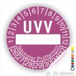 Prüfetiketten, rund, Farbe- Lila, Text "UVV Nächster Prüftermin" in Weiß. Als nächstes kommt ein Beschriftungfeld / Leerfeld in Farbe Weiß. Startjahr- 26, Monatszahlen Oben und Jahreszahlen Unten in Kreisform. über den Jahreszahlen Text "Nächster Prüftermin" Die Prüfplakette wird verwendet zur Prüfung von Anlagen & Maschine.