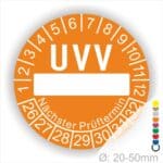 Prüfetiketten, rund, Farbe- Orange, Text "UVV Nächster Prüftermin" in Weiß. Als nächstes kommt ein Beschriftungfeld / Leerfeld in Farbe Weiß. Startjahr- 26, Monatszahlen Oben und Jahreszahlen Unten in Kreisform. über den Jahreszahlen Text "Nächster Prüftermin" Die Prüfplakette wird verwendet zur Prüfung von Anlagen & Maschine.