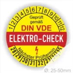 Alt-Text: Rundes Prüfsiegel für Elektro-Checks gemäß DIN VDE, gelb und rot, mit Angabe des nächsten Prüftermins und einem Durchmesser von 25-50 mm.