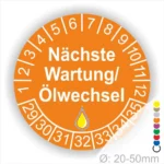 Prüfetiketten, Serviceplakette rund, Farbe- Orange, Text "Nächste Wartung/Ölwechsel" in Weiß. Startjahr- 29, Monatszahlen Oben und Jahreszahlen Unten in Kreisform, über den Jahreszahlen ein Öltropfen als Icon/Piktogramm in Gelb.