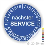 Kontrollplakette Service, Prüfetiketten rund, Farbe- Blau, Text "nächster SERVICE" in weiß. Startjahr- 27, Monatszahlen Oben und Jahreszahlen Unten in Kreisform.