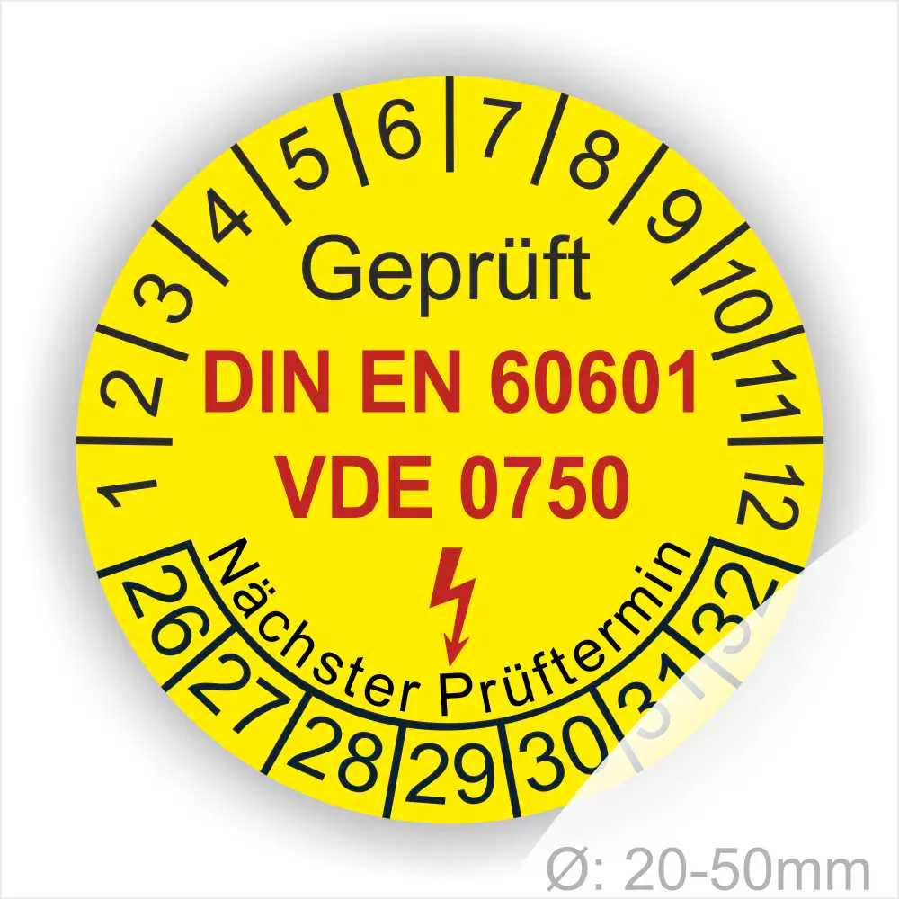 pruefplakette-din-en-60601-vde-0750-medizinische-geraete-gelb-startjahr-26 Runde gelbe Prüfplakette „Geprüft DIN EN 60601 VDE 0750“ für medizinische elektrische Geräte mit Monatsring und Jahresring, Blitzsymbol und Aufdruck „Nächster Prüftermin“, Ø 20–50 mm