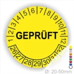 Gelbes Prüfetikett mit der Aufschrift "GEPRÜFT", umgeben von Zahlen von 1 bis 32, für Objekte mit einem Durchmesser von 20-50 mm.