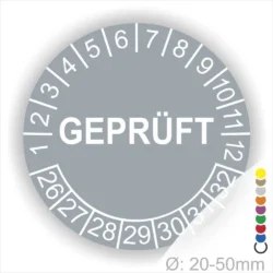 Rundschild mit der Aufschrift "GEPRÜFT" und Zahlen von 1 bis 32, geeignet für Durchmesser von 20-50 mm, in grauer Farbe.