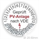 Alt-Text: Prüfplakette für PV-Anlage nach VDE mit nächstem Prüftermin und Durchmesserangabe von 20-50 mm.