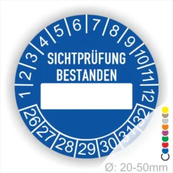 Prüfplakette, Prüfetikett rund, Farbe- Blau, Text "SICHTPRÜFUNG-BESTANDEN" in Weiß. Als nächstes kommt ein Beschriftung Feld / Leer Feld in Farbe Weiß. Startjahr- 26, Monatszahlen Oben und Jahreszahlen Unten in Kreisform.
