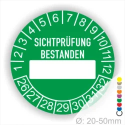 Prüfplakette, Prüfetikett rund, Farbe- Grün, Text "SICHTPRÜFUNG-BESTANDEN" in Weiß. Als nächstes kommt ein Beschriftung Feld / Leer Feld in Farbe Weiß. Startjahr- 26, Monatszahlen Oben und Jahreszahlen Unten in Kreisform.