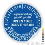 Prüfschild für Lagereinrichtungen, blau mit Angaben zu DIN EN 15635 und DGUV R 108-007, nächste Prüfintervalle von 1 bis 12, Durchmesser 20-50 mm.