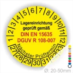 Gelbes Prüfzeichen für Lagereinrichtungen, geprüft gemäß DIN EN 15635 und DGUV R 108-007, mit nächstem Prüftermin und Durchmesserangabe von 20-50 mm.