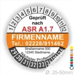 Sicherheitsprüfsiegel gemäß ASR A1.7 mit Firmennamen, Kontaktnummer und nächstem Prüftermin, dargestellt in einem runden Design mit farbigen Markierungen.