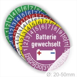 Batteriewechsel-Aufkleber in verschiedenen Farben mit dem Text "Batterie gewechselt" und einem Batteriesymbol, Durchmesser 20-50 mm. Ideal zur Kennzeichnung von Geräten nach Batteriewechsel.