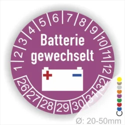 Prüfsiegel, Prüfplakette rund, Farbe- lila, Text "Batterie gewechselt" in Rot. Icon Batterie, Startjahr- 26, Monatszahlen Oben und Jahreszahlen Unten in Kreisform.