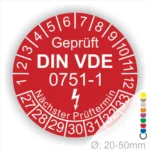Rotes Prüfetikett mit der Aufschrift "Geprüft DIN VDE 0751-1", das die nächsten Prüftermine anzeigt. Durchmesser von 20-50 mm. Ideal für die Kennzeichnung von elektrischen Geräten.