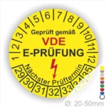 Runde gelbe VDE E-Prüfung Prüfplakette mit Monatsring und Jahresring, Blitzsymbol und Aufdruck „Geprüft gemäß VDE – Nächster Prüftermin“, Ø 20–50 mm