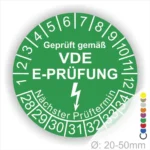 VDE E-Prüfplakette in grün mit Prüfziffern und nächstem Prüftermin, geeignet für Geräte mit einem Durchmesser von 20-50 mm.